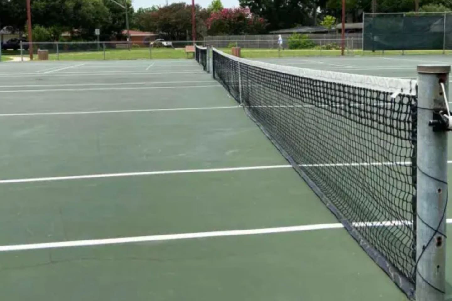 tennis/pickle ball court is right by the house