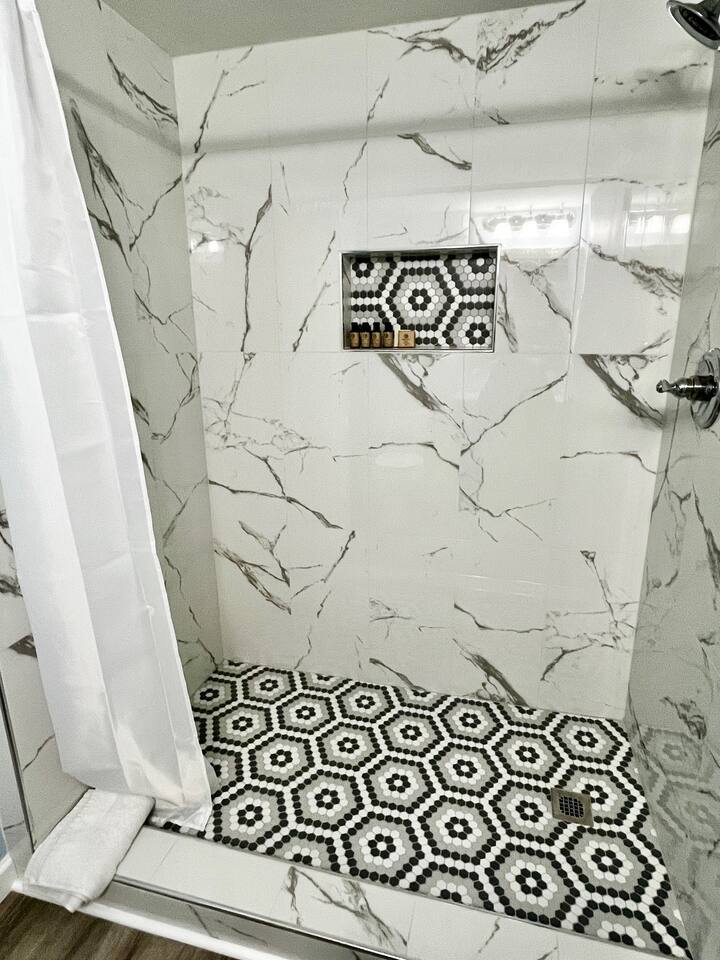Updated walk-in shower for your enjoyment and perfect for those who have accessibility needs. 