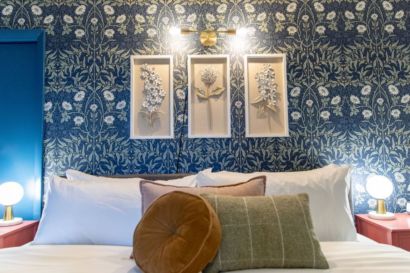 Plush bed with a comfortable mattress, crisp sheets, and an array of soft pillows, ensuring a restful and rejuvenating night's sleep.