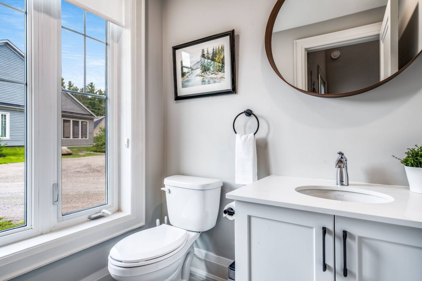 A polished powder room tucked just off the main living spaces.
