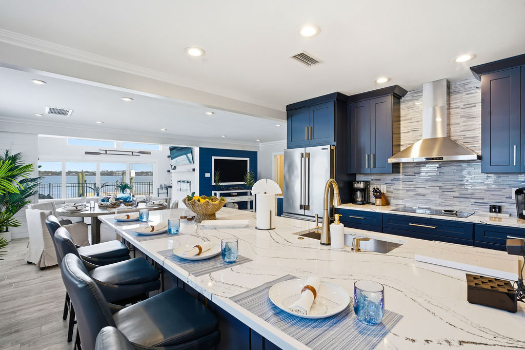 This spacious kitchen is perfect for gathering the crew, sharing meals, and planning the day’s adventures.