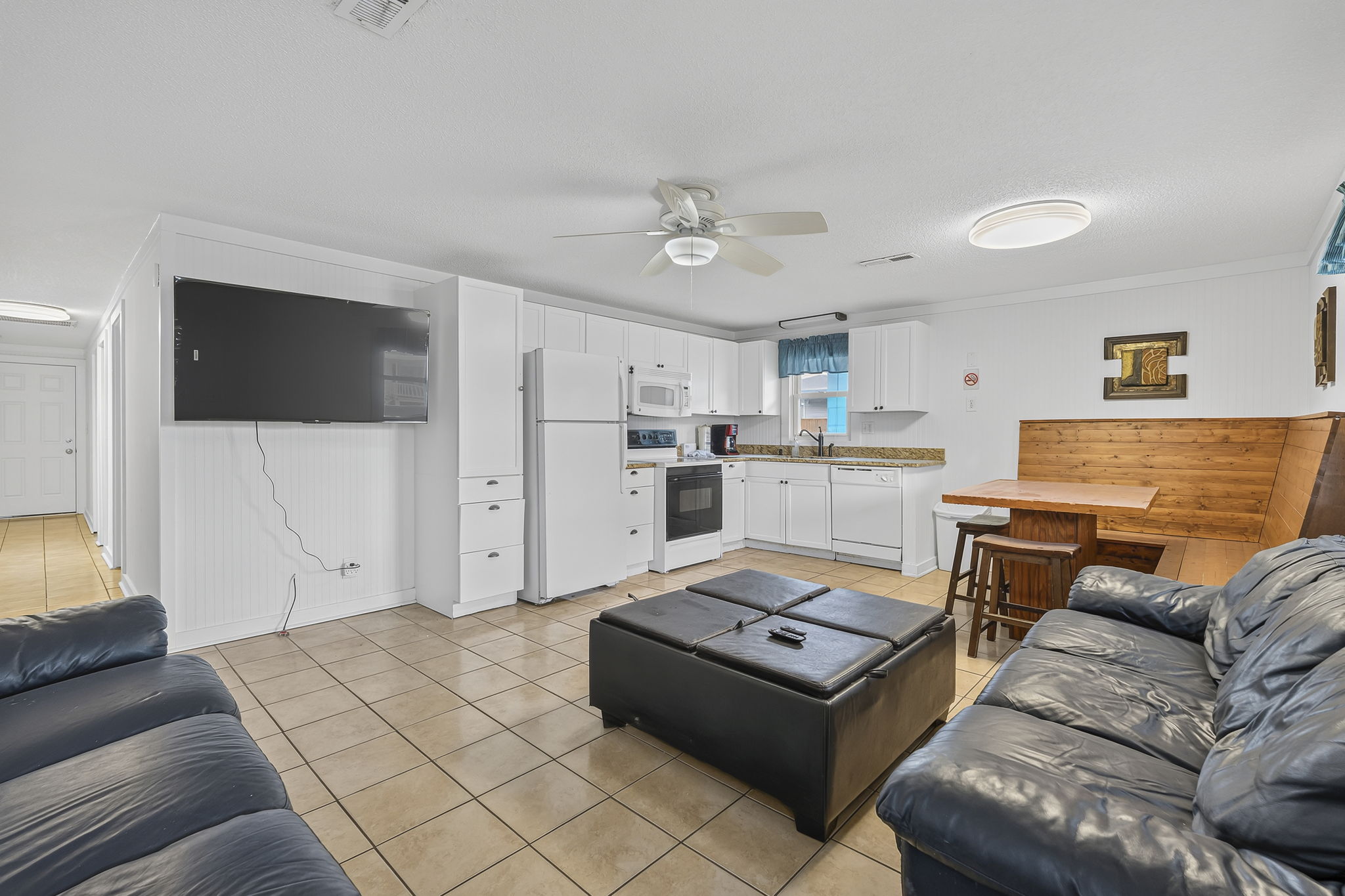 Full Kitchen with Dining Room table that seats 8 and Smart TV