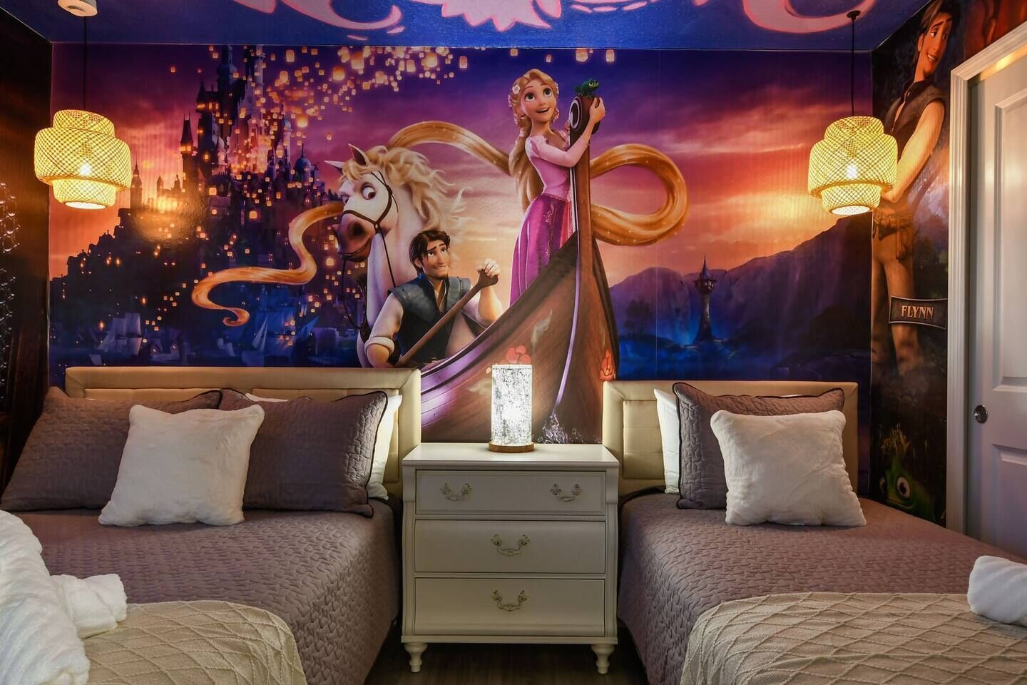 Inspired by Rapunzel’s story, this lovely themed room shares a Jack-and-Jill bathroom with the King Pink Bedroom. Includes a smart TV.