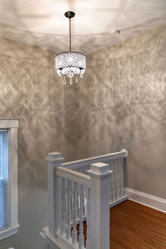 Elegant chandelier, adding a touch of sophistication and charm to the room, creating a warm and inviting ambiance.