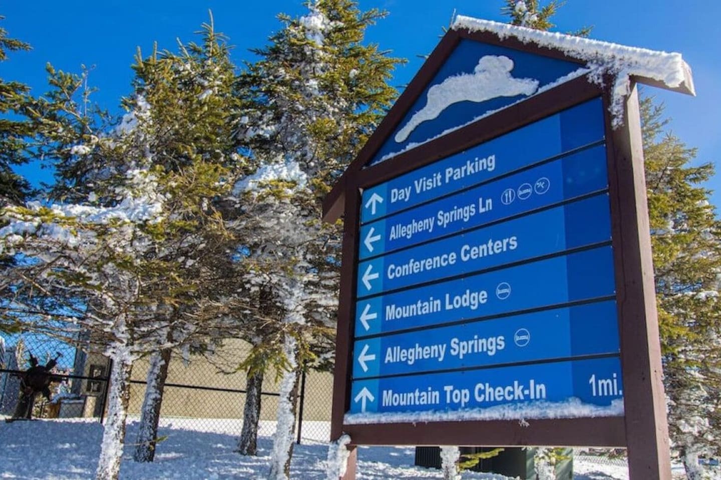 Look for the Mountain Lodge sign for parking entry
