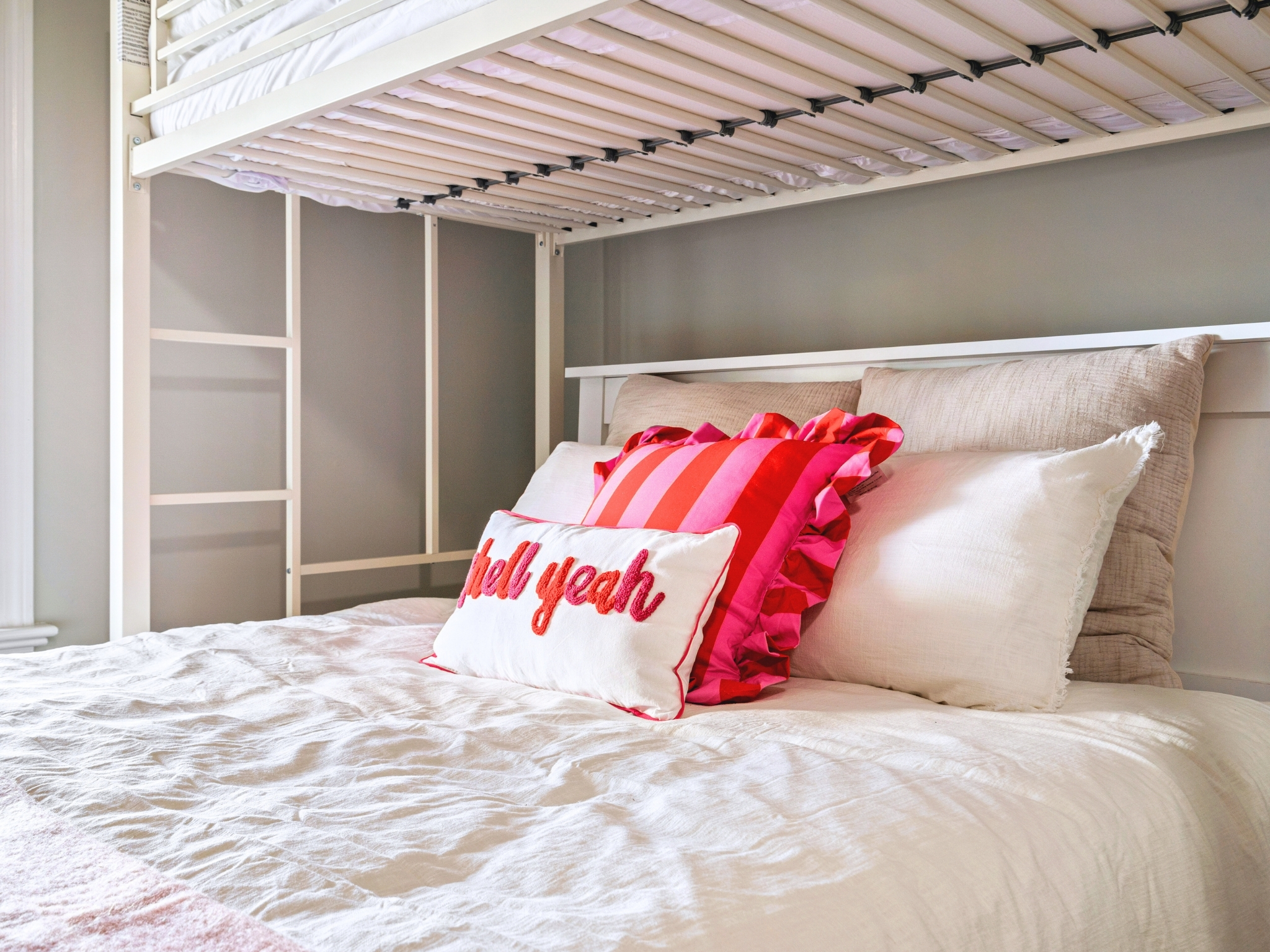 Our basement’s first bedroom is ready for you, with two queen-sized beds and two twin beds, making it great for families or friends.