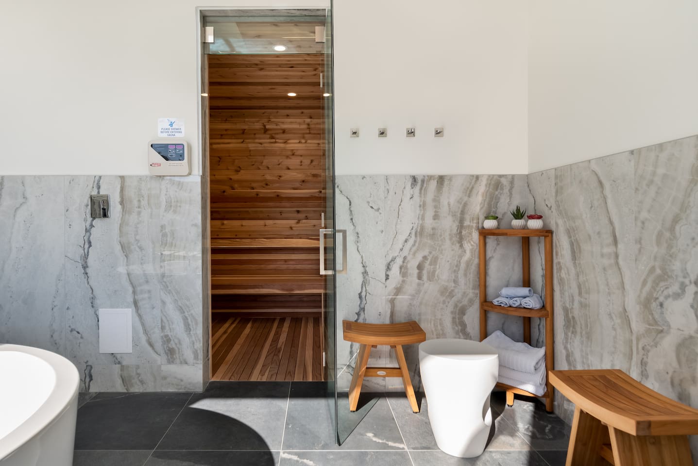 Aromatic cedar dry sauna with seating for eight