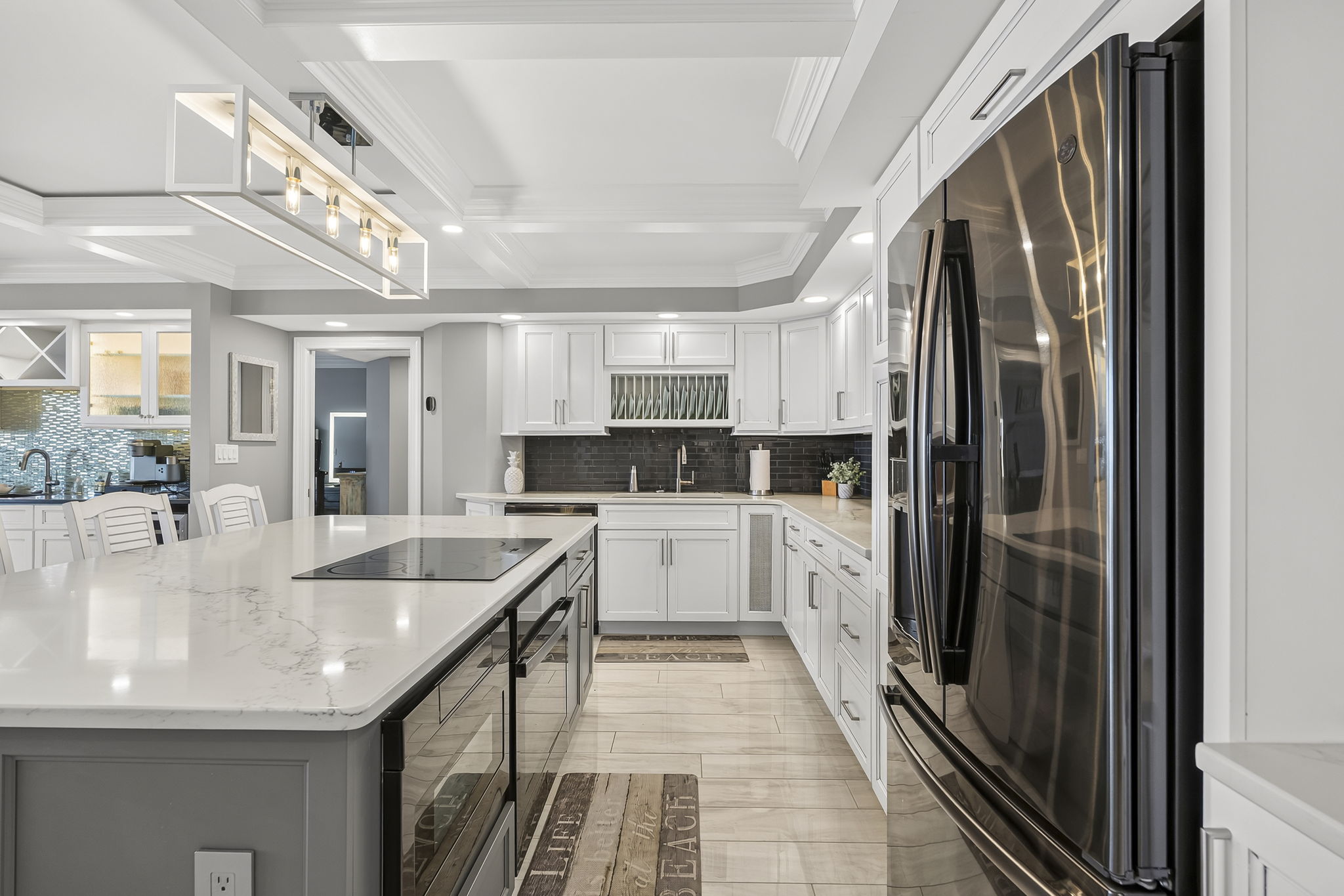 Gourmet kitchen with black stainless steel appliances 