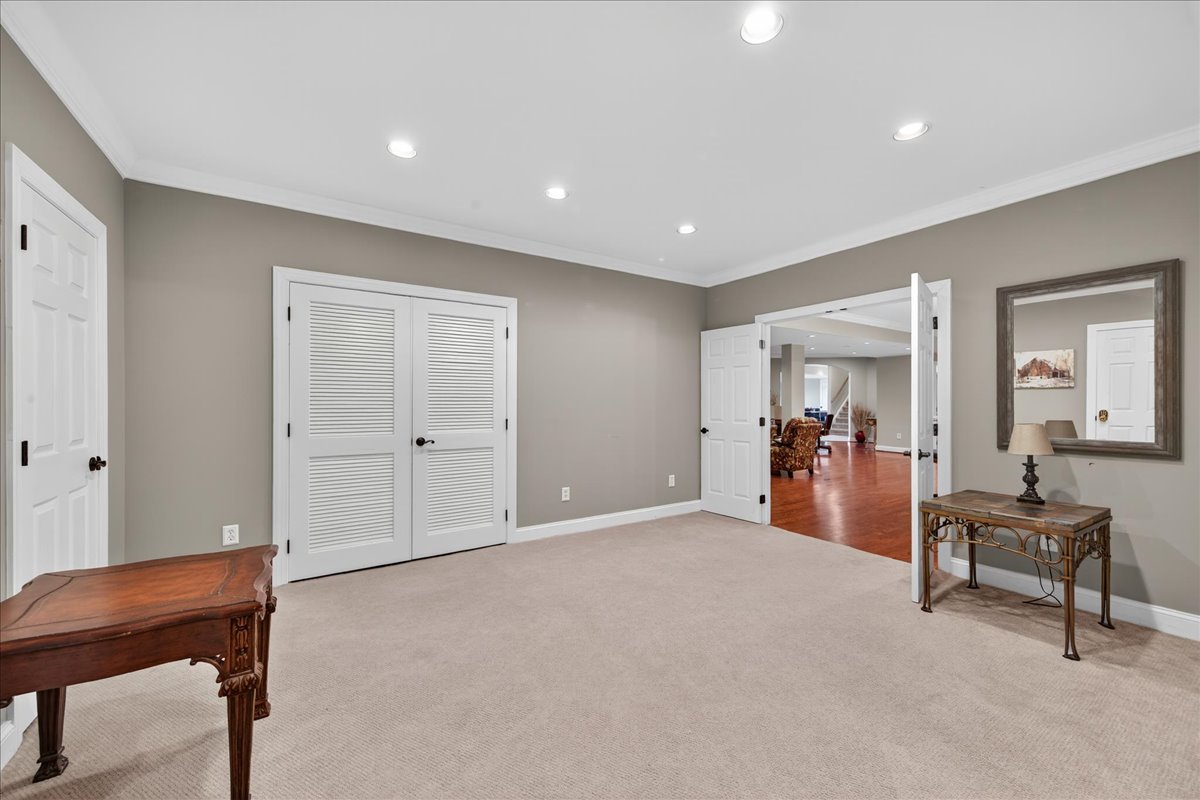 Generous open area in the bunkroom makes it more than just a place to sleep.