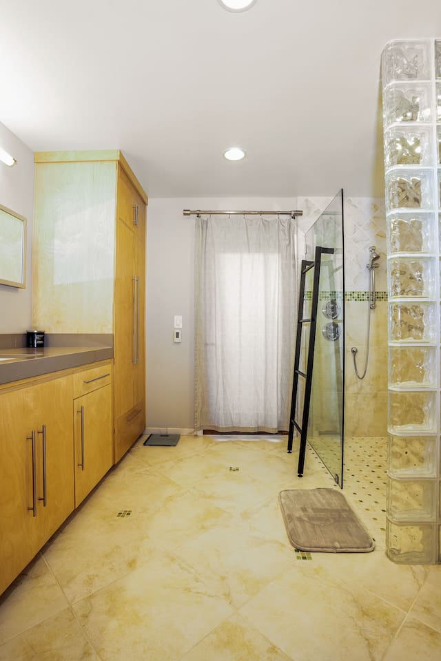 Primary bathroom with walk-in shower.