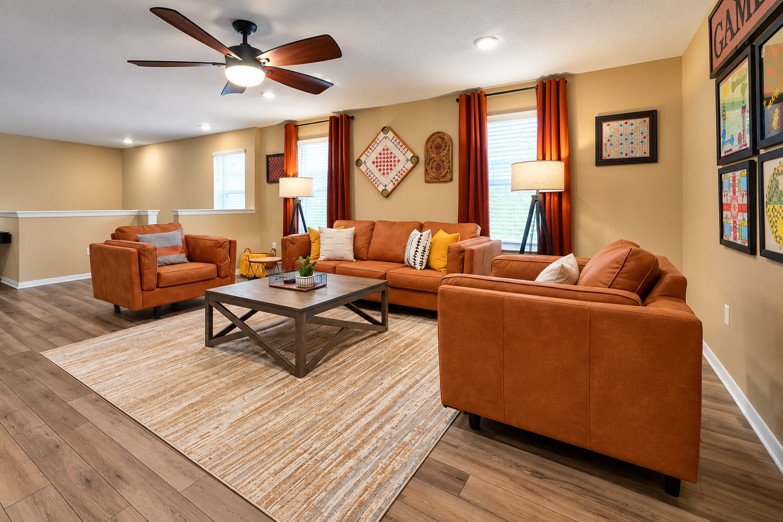 At the top of the stairs, you will find a super comfortable family room designed with family game night in mind.