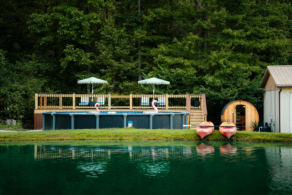 Your private outdoor retreat - pond, pool, sauna, sunshine, and wooded surroundings.