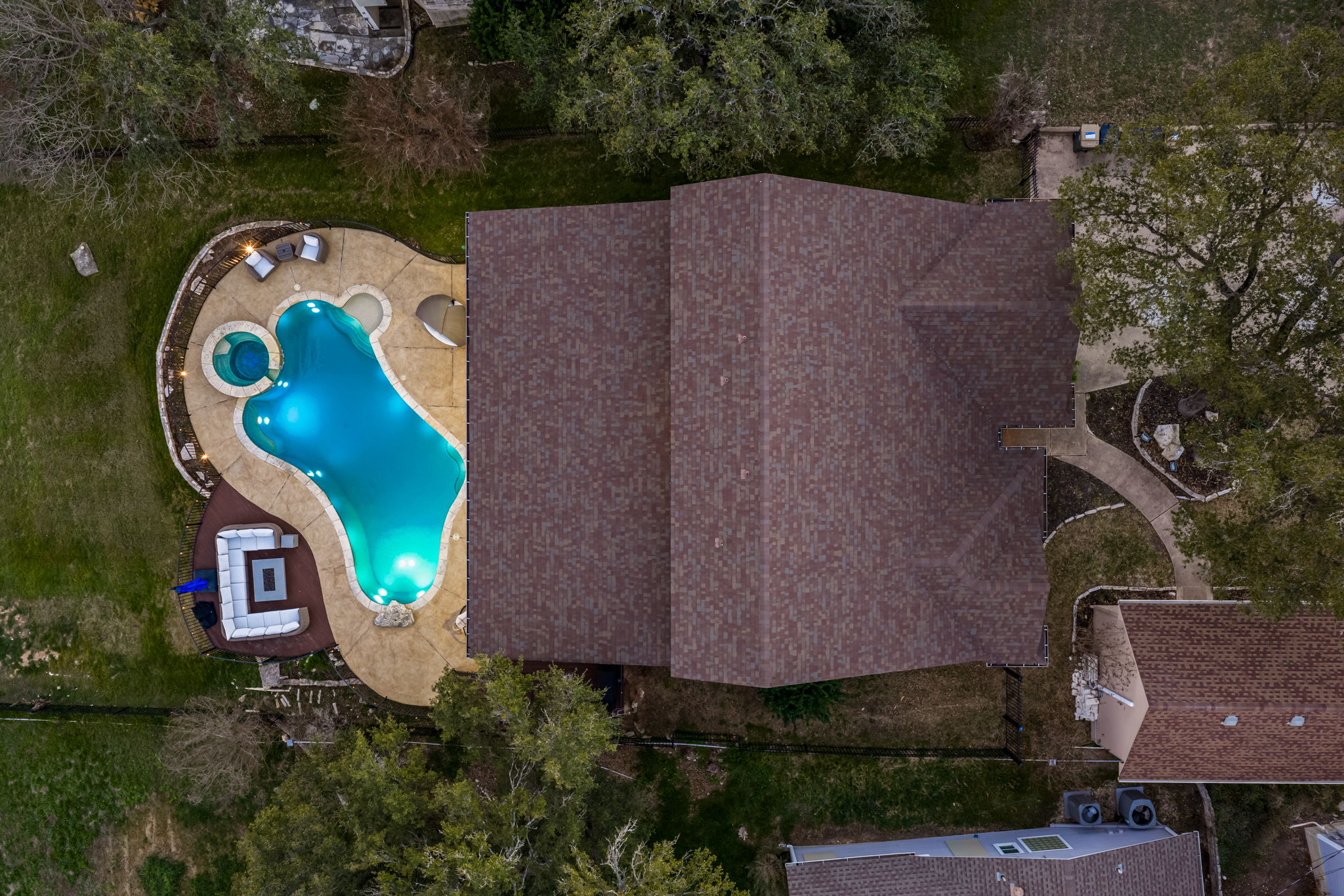 Top-down aerial of the property highlighting the private pool and layout.