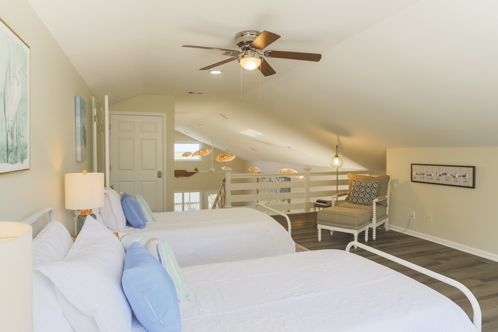 Bright and inviting sleeping space with thoughtful details for comfort.