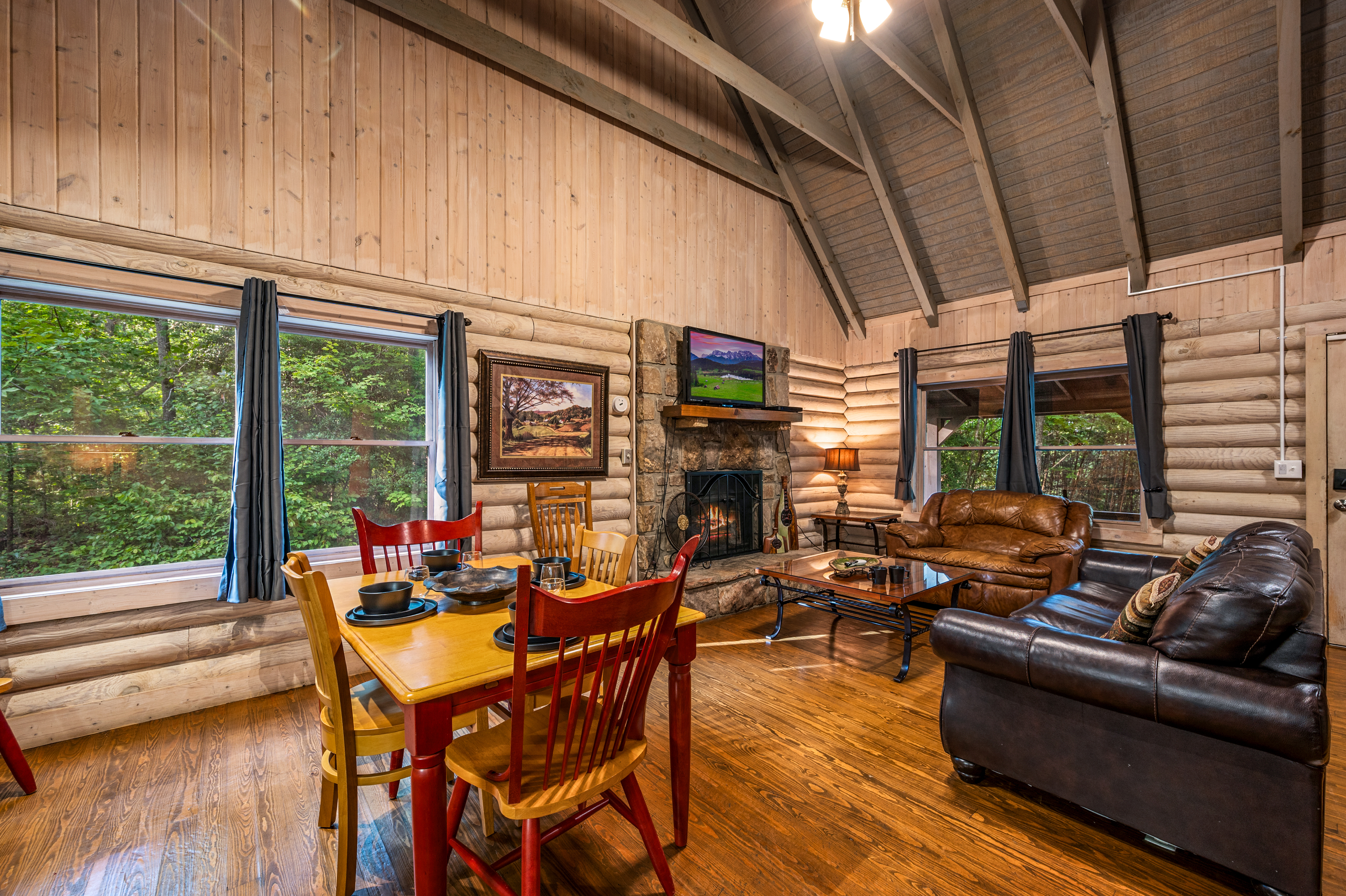 Enjoy this cozy log cabin with fireplace, TV, and dining