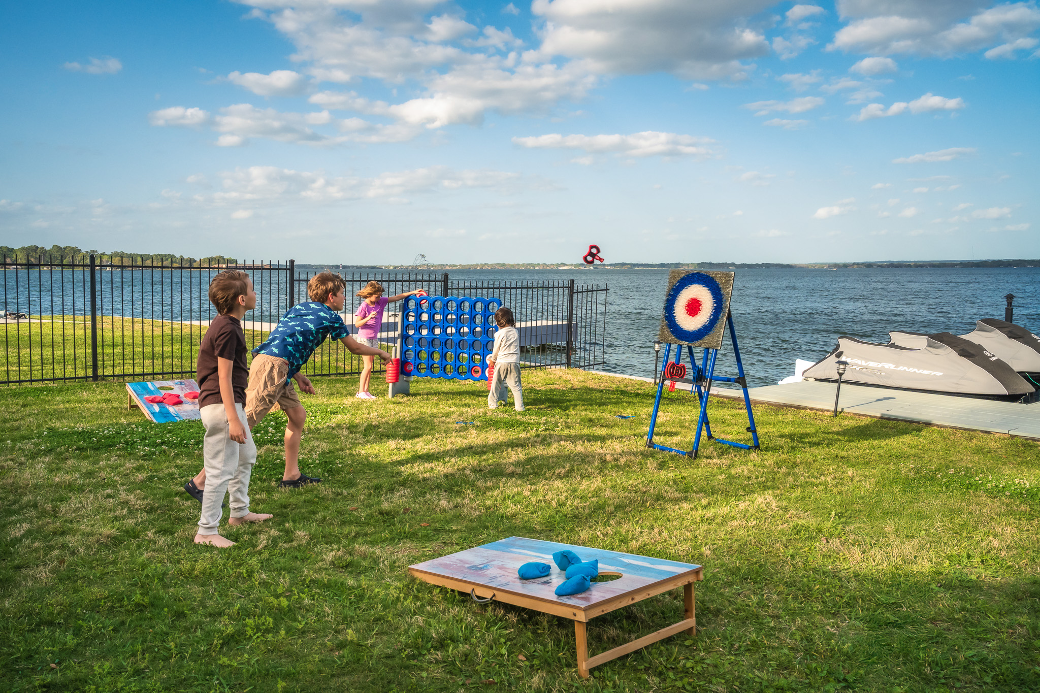 “Let the games begin! From cornhole to Connect 4, the backyard fun never stops when the lake is your playground.