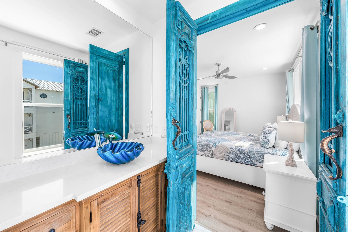 Step through 200-year-old Antique French Doors into a master ensuite where historic European charm meets 30A innovation. ️ Experience ultimate spa vibes with color-changing LED  high-tech rain shower.   This is a unique high-tech retreat 