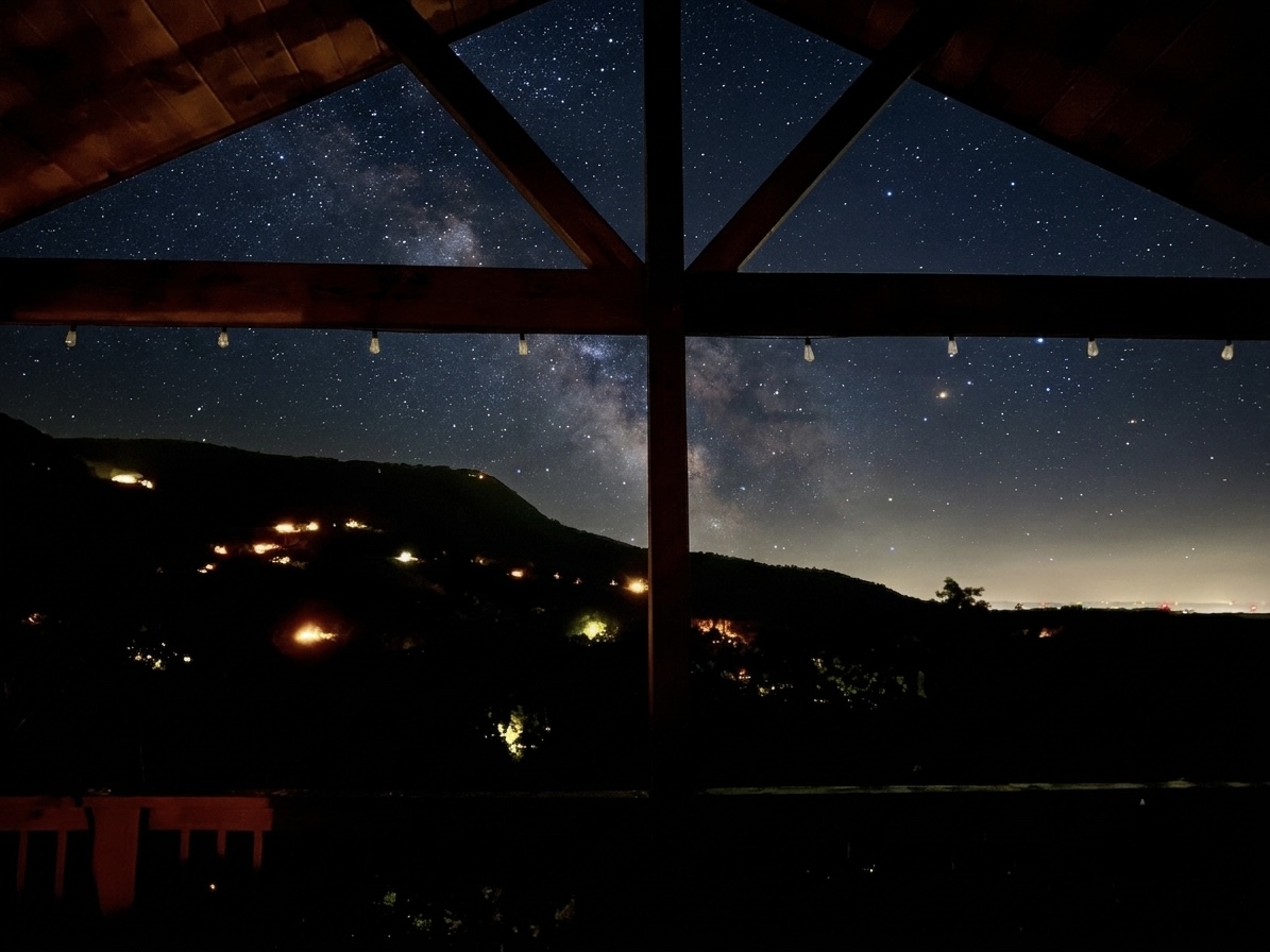 Cuddle up on our bed swing and stargaze for miles and miles of Smoky Mountain views.