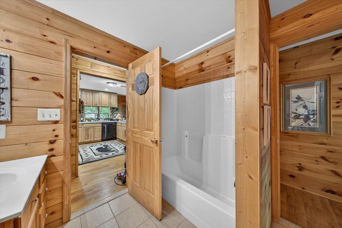 Shared main floor bathroom—central and easily accessible.