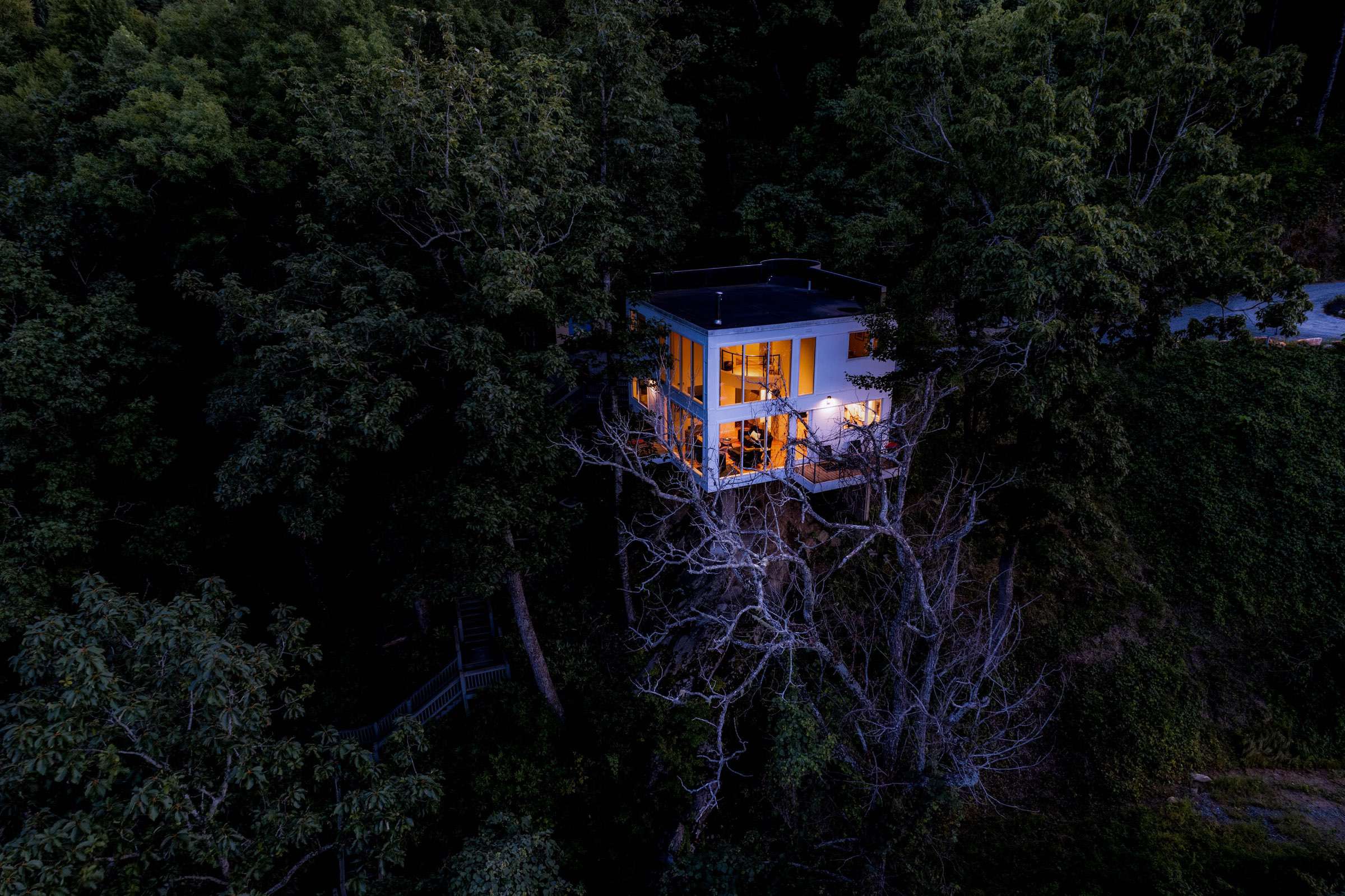 The tree house glows as darkness sets over the Smoky Mountains!