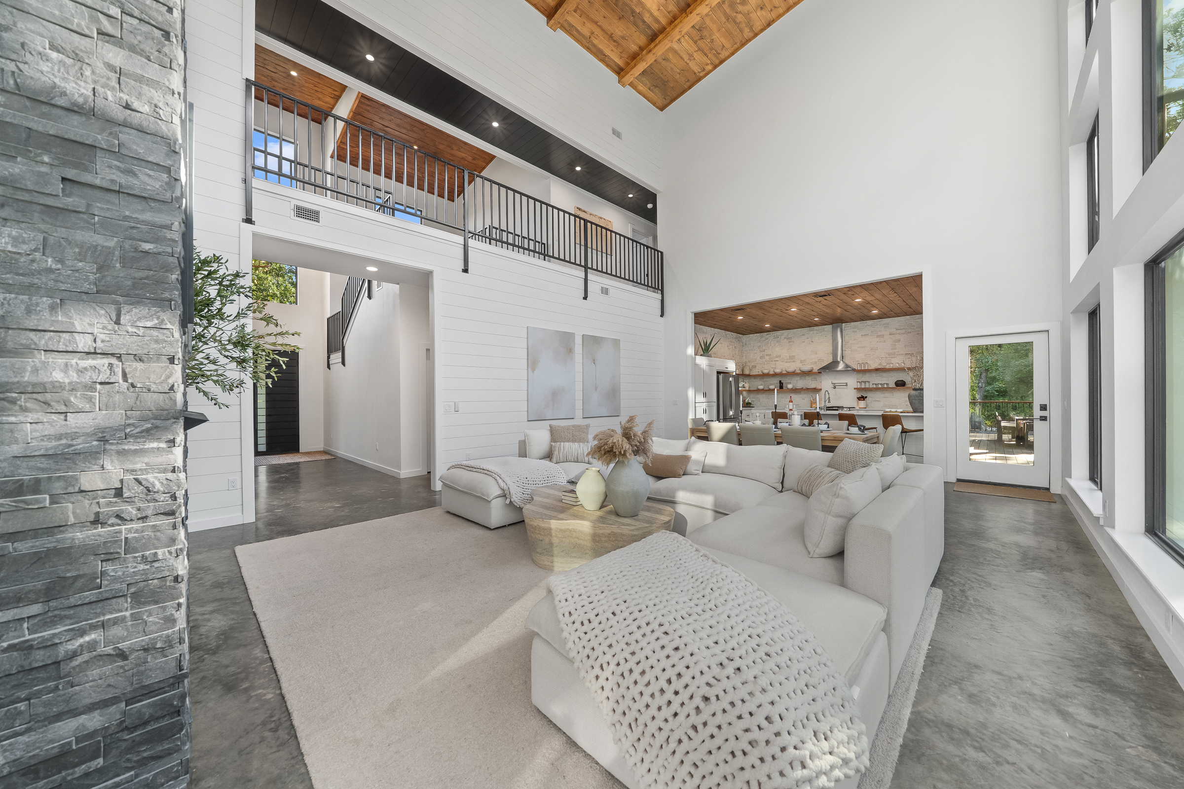 Modern and luxurious living space with high-end finishes and furniture throughout