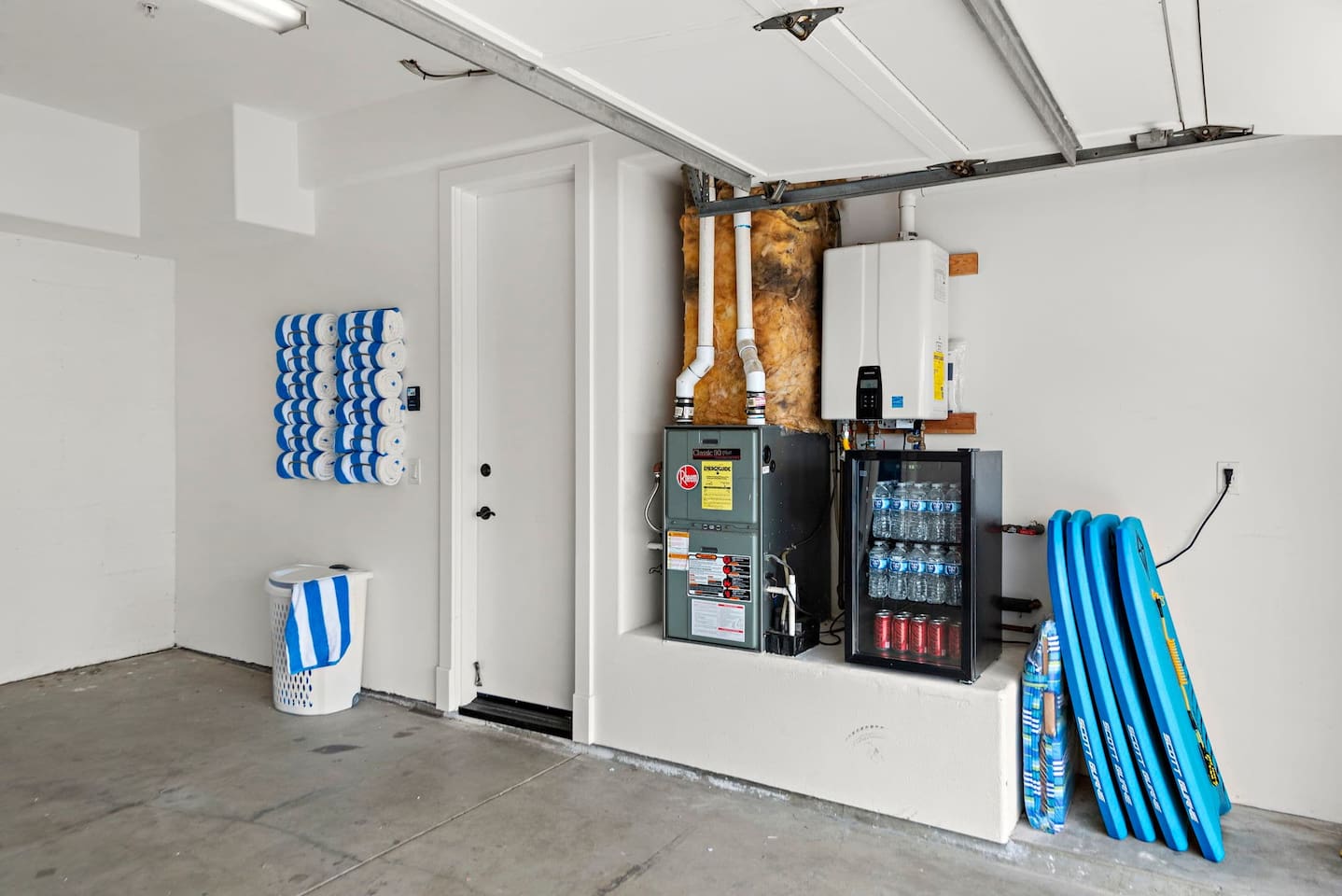 Boogie Boards and Beach Towels.  Also, a drink fridge stocked with water and snacks for ping pong or bike rides