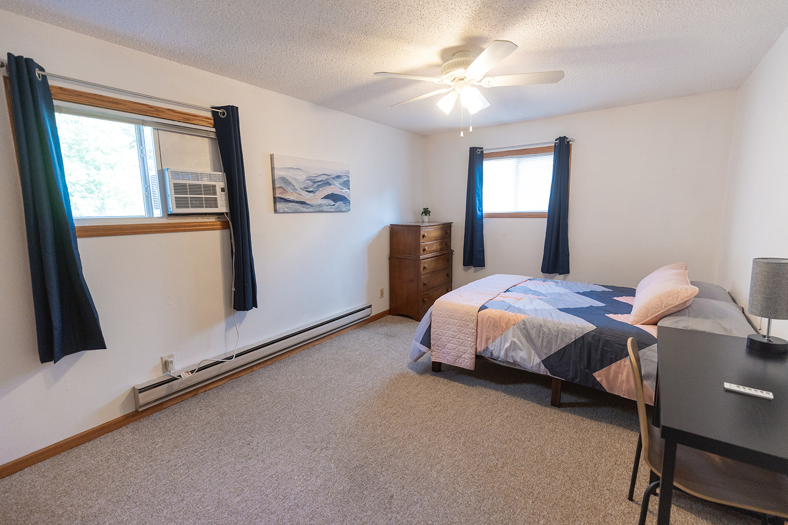 queen bed in larger room