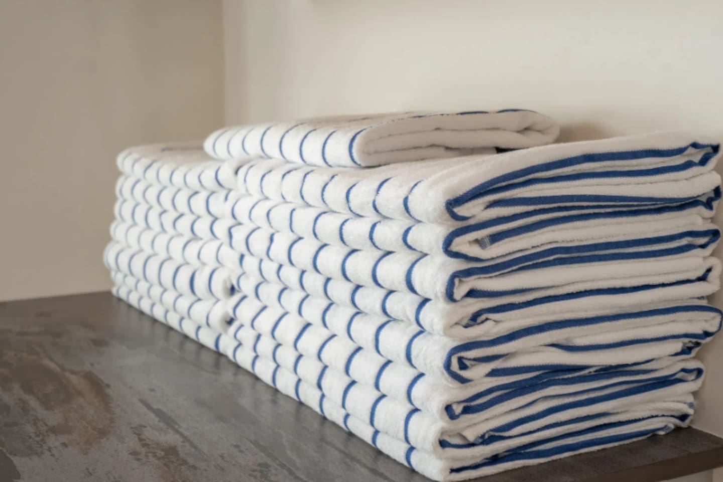 Fresh, neatly stacked towels are ready and waiting for every guest.
