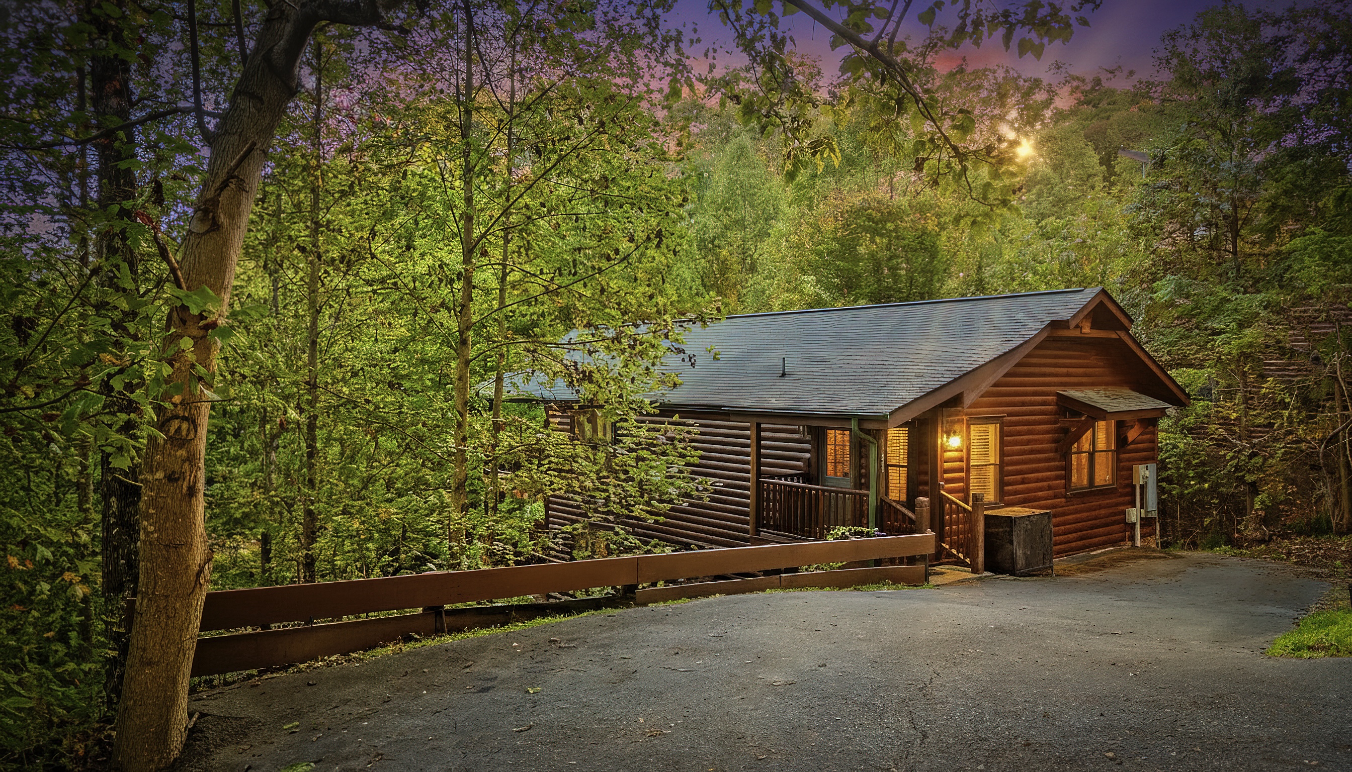 Front entrance and driveway. Driveway can fit in two large or squeeze three normal sized vehicles