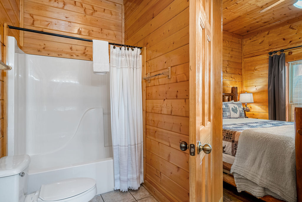 Rinse off the day or soak it in&mdash;this tub and shower combo blends rustic charm with everyday comfort, perfect for your mountain stay.