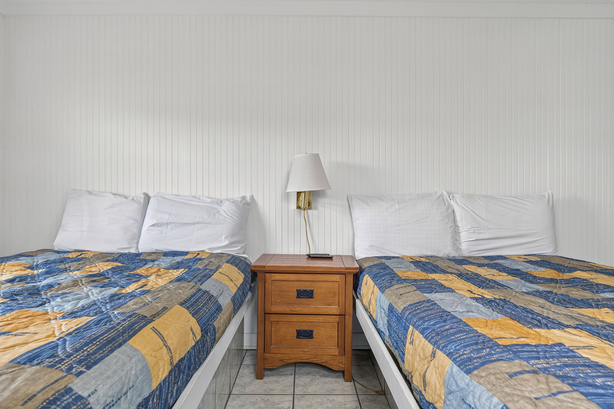Primary Bedroom with two queen beds Unit 3