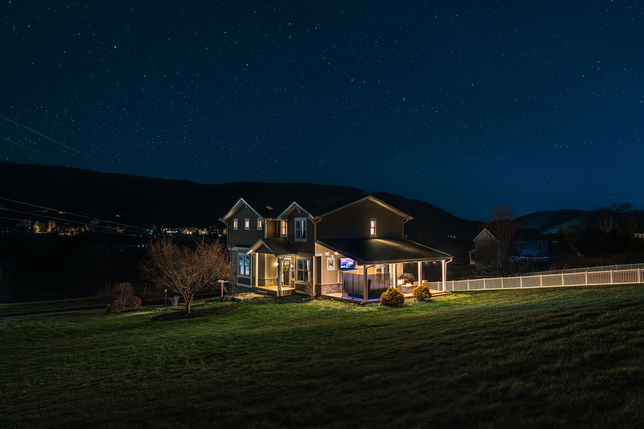 Peaceful nighttime setting with open views — quiet, private, and beautifully lit after dark.