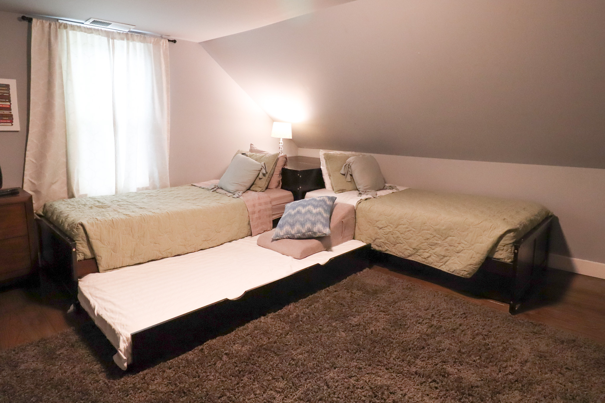 Large bedroom that provides sleeping for 3 with trundle bed