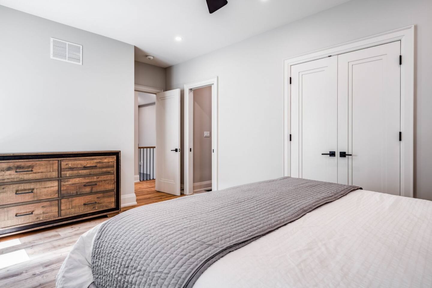 A peaceful king retreat with ensuite bathroom tucked away on the upper level.