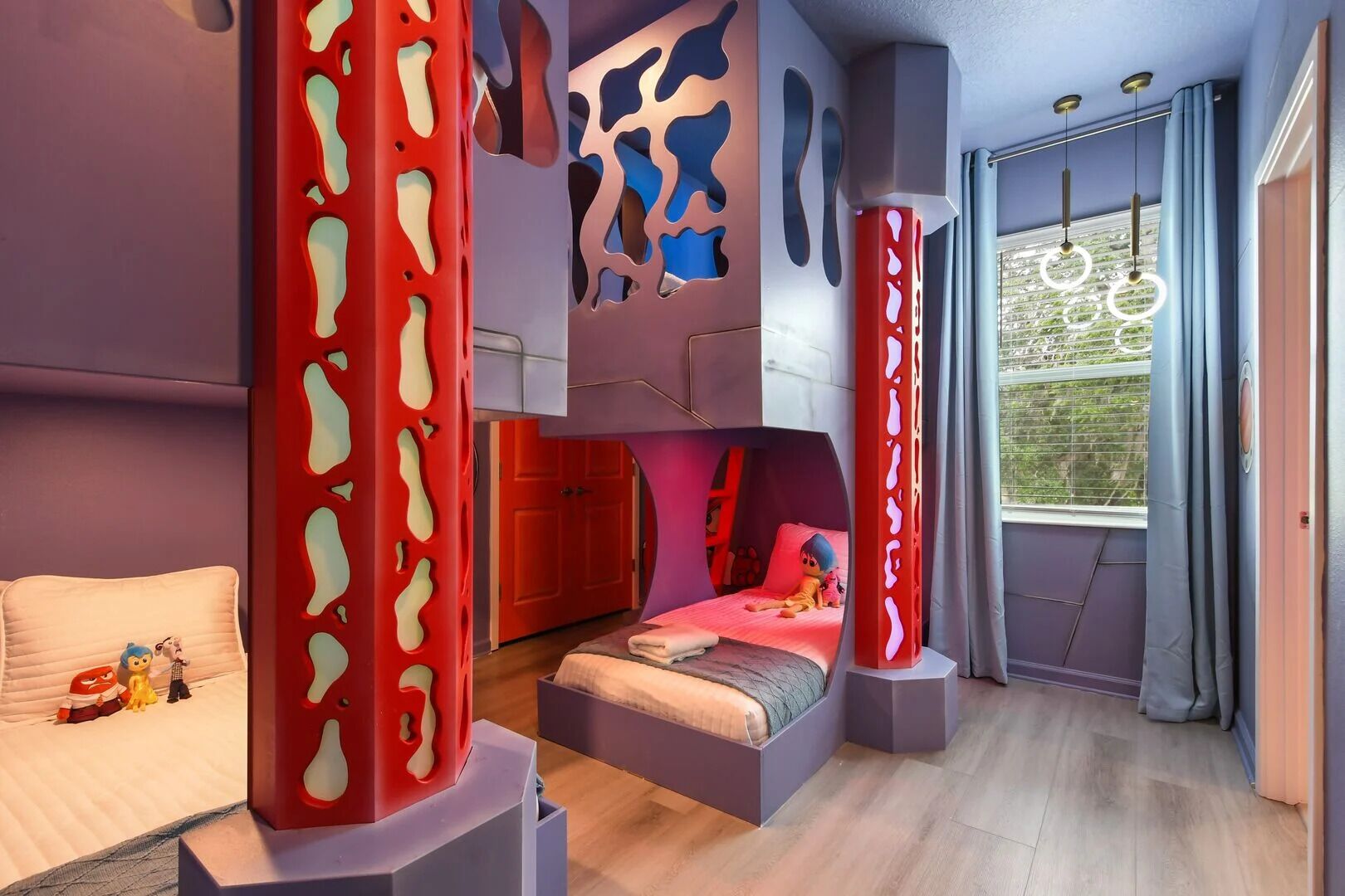 Step into a world of emotions: This Inside Out-themed kids’ room is a vibrant adventure of imagination and joy!