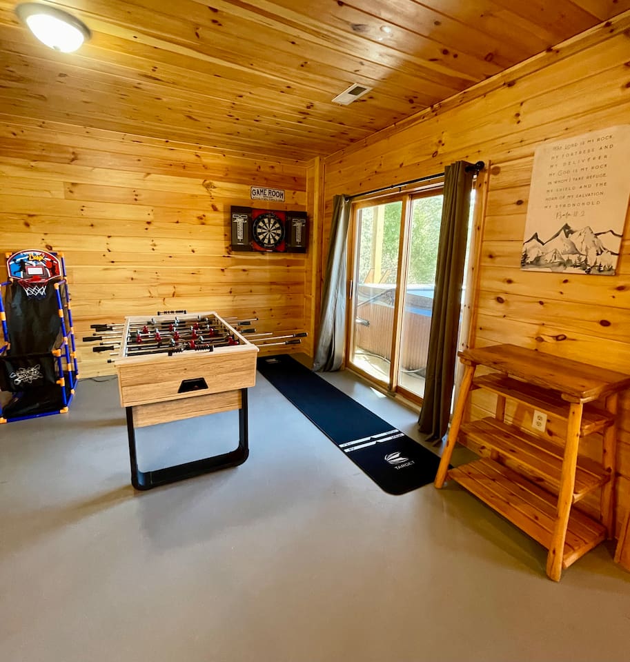 Basement game room includes ping pong, darts, foosball; wall games like connect four, ring toss, and tic tac toe; and plenty of board games, puzzles and more!