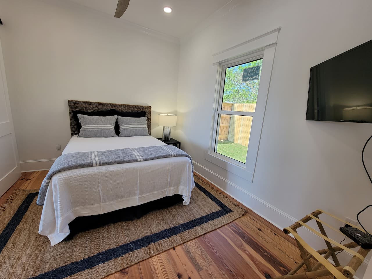 Guest bedroom with queen bed.