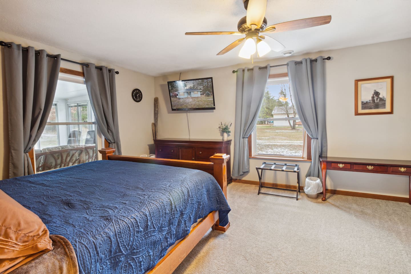 Master bedroom offers blackout curtains,  privacy shades and a convenient luggage rack for extra room to access your things easily.