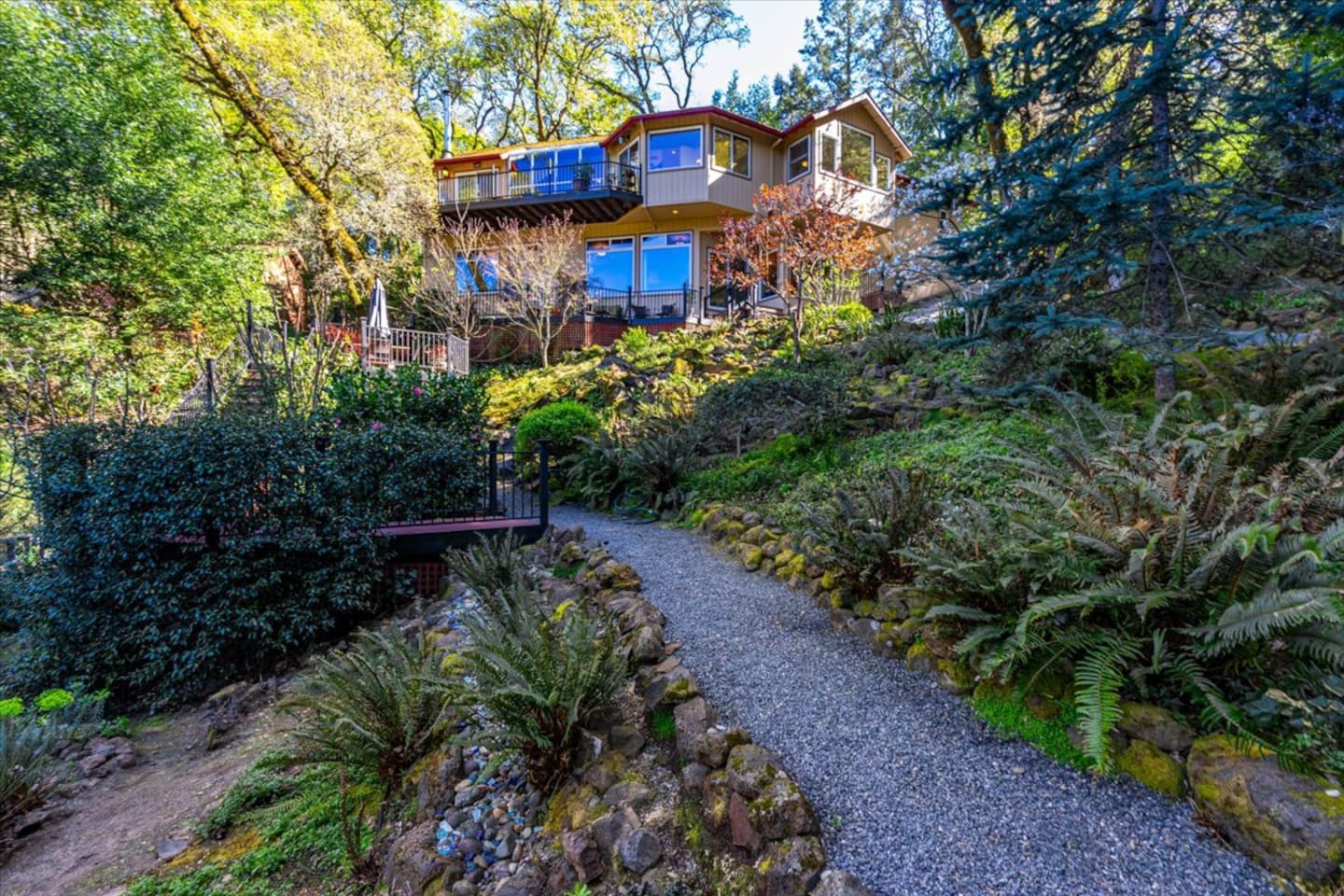 Stroll the scenic pathway from house to garden and golf area.