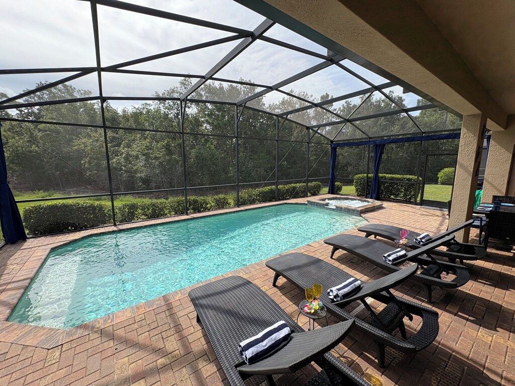 Private Southeast-facing Lanai with pool & spa abutting conservation land