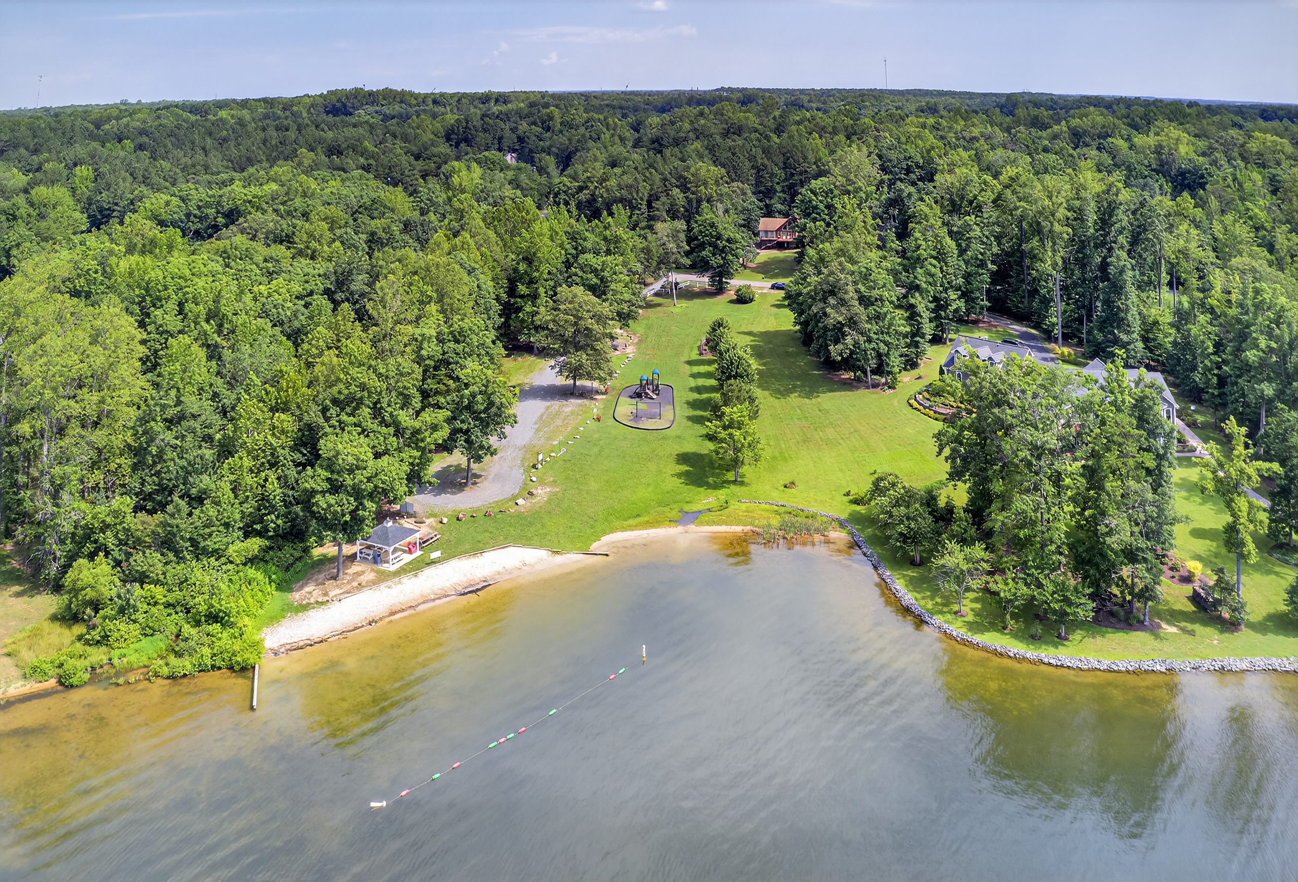 Guests can enjoy access to a beautiful community beach with soft sand and calm swimming waters.