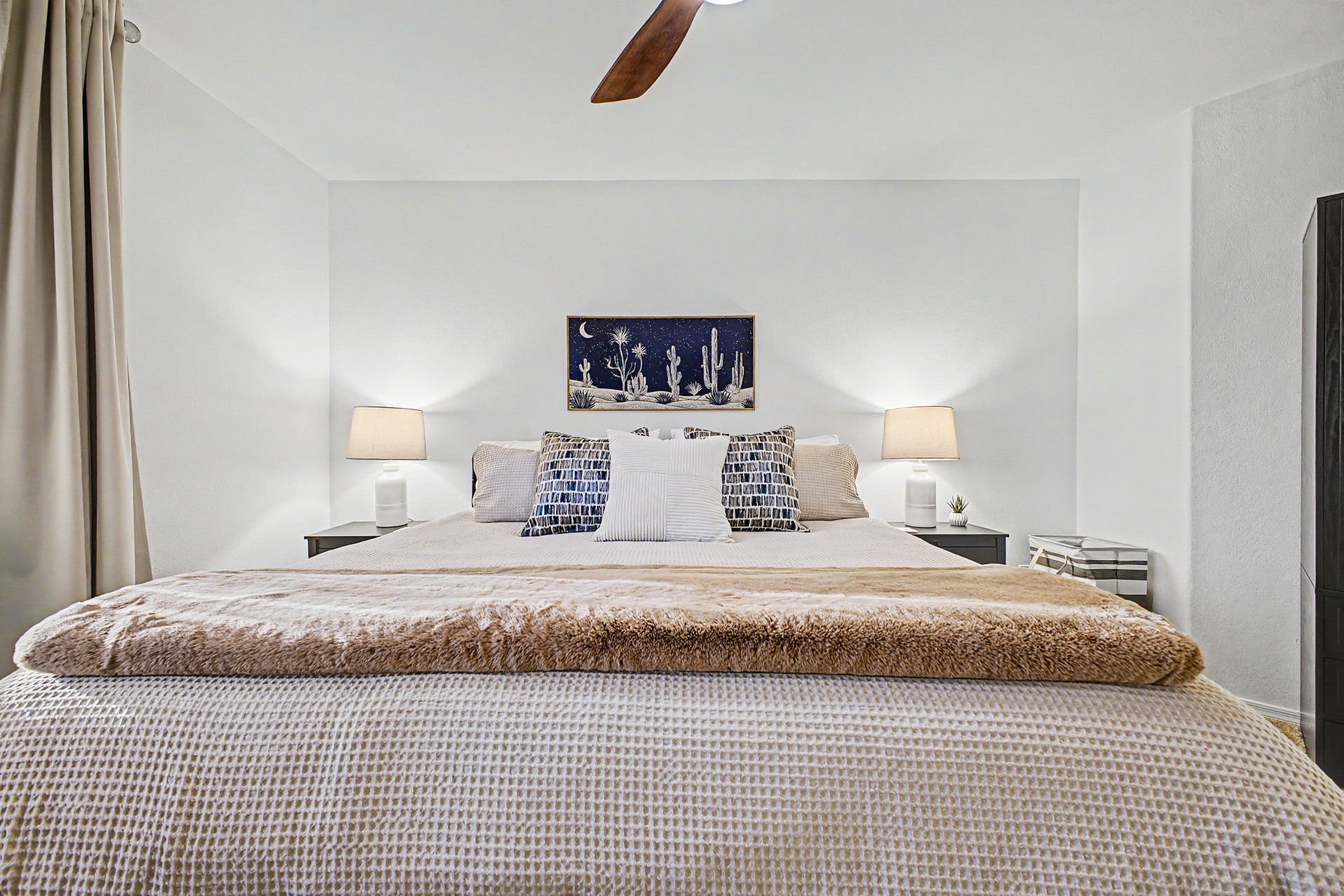 King bedroom 4 upstairs with 55" Smart TV, blackout curtains, ceiling fan, desk and chair