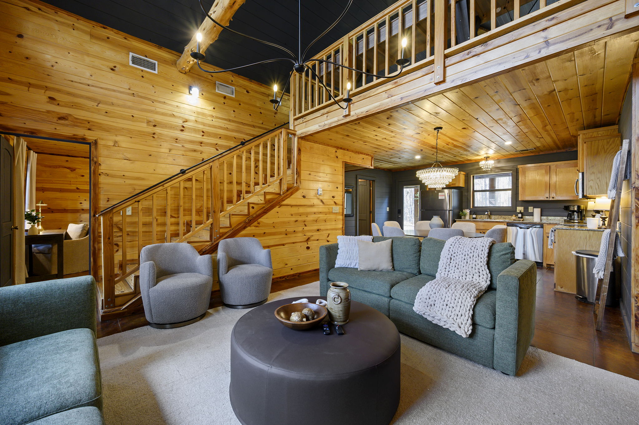 Indoor Living Retreat:
Step inside to wood-accent warmth and cushy seating — the perfect blend of rustic charm and relaxed luxury. 💫