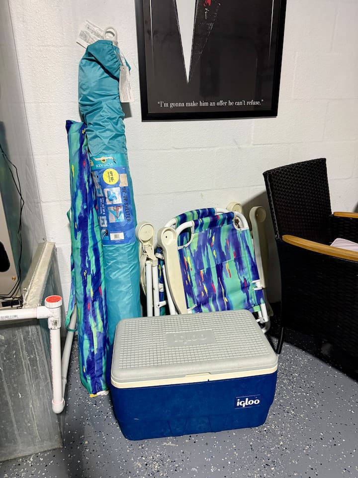 Beach gear: including beach umbrella, sun shade, two beach chairs and a cooler
