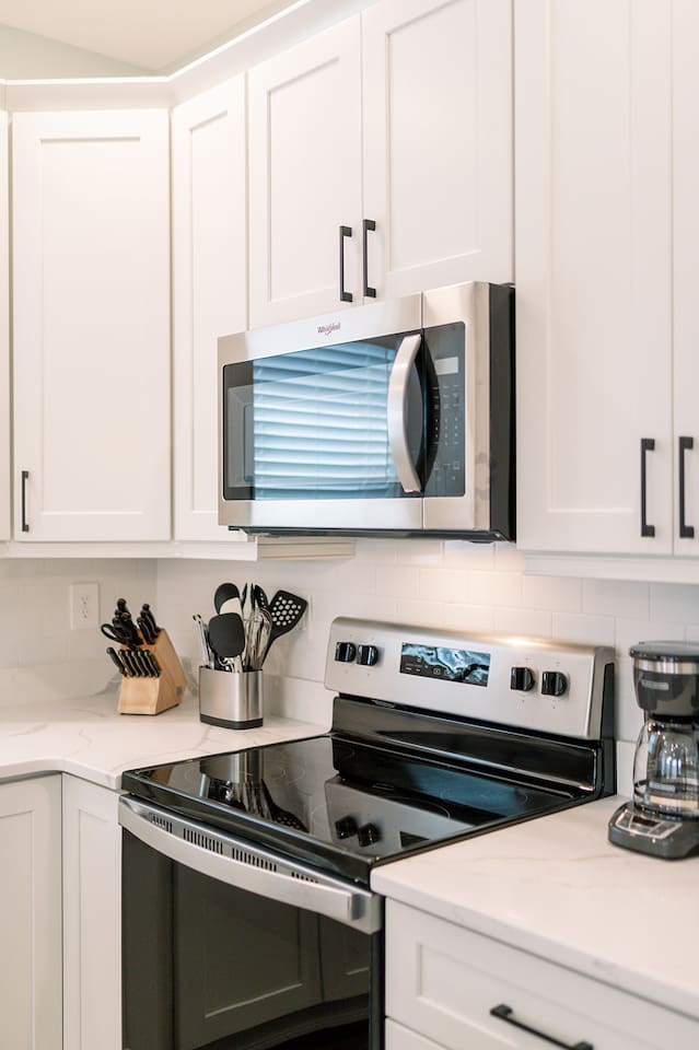 Thoughtfully designed kitchen featuring generous counter space and updated finishes.