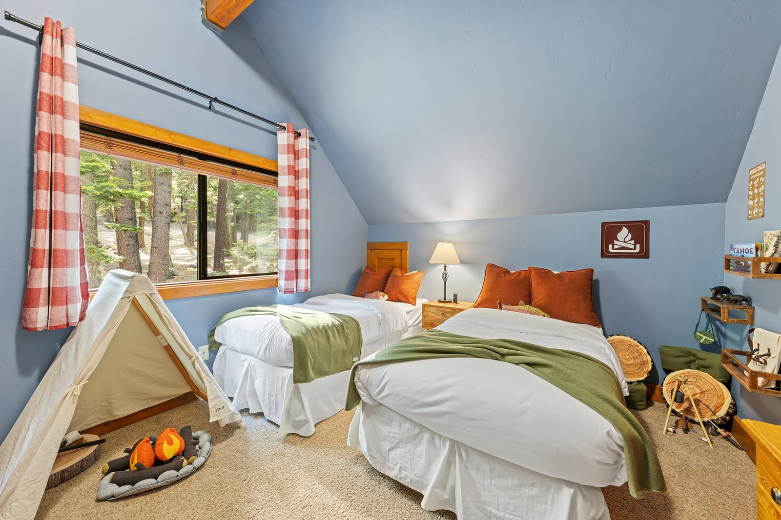 Give the cousins a room of their own — twin beds, a tent fort, and bear-and-Tahoe touches everywhere they look.