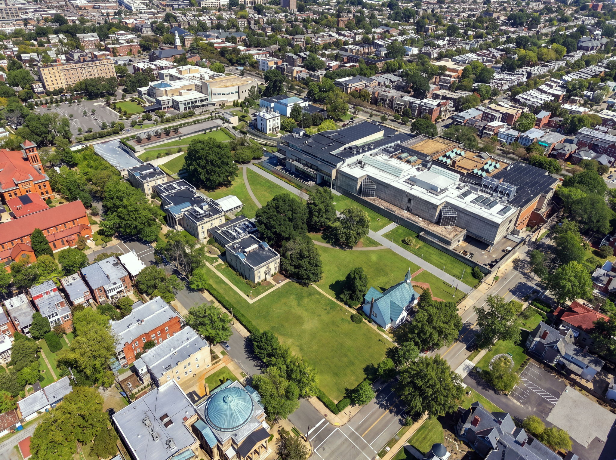 Aerial View: Discover vibrant Richmond from above, surrounded by lush greenery and historic charm!