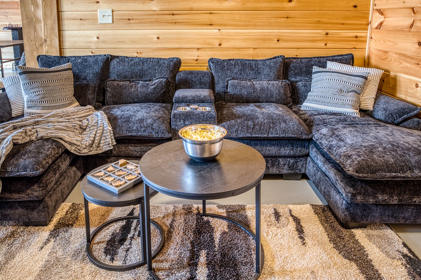 Movie room right off the game room includes big screen smart TV with streaming available, DVD player, and Wii video games!