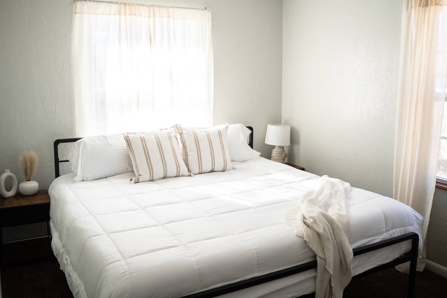 Unwind in your private retreat—master bedroom with a plush king bed.