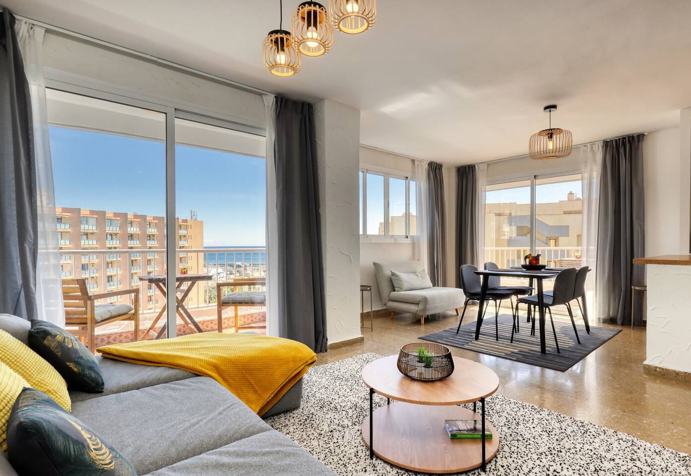 Specious and sunny living room with views over the sea and beautiful Benalmadena port